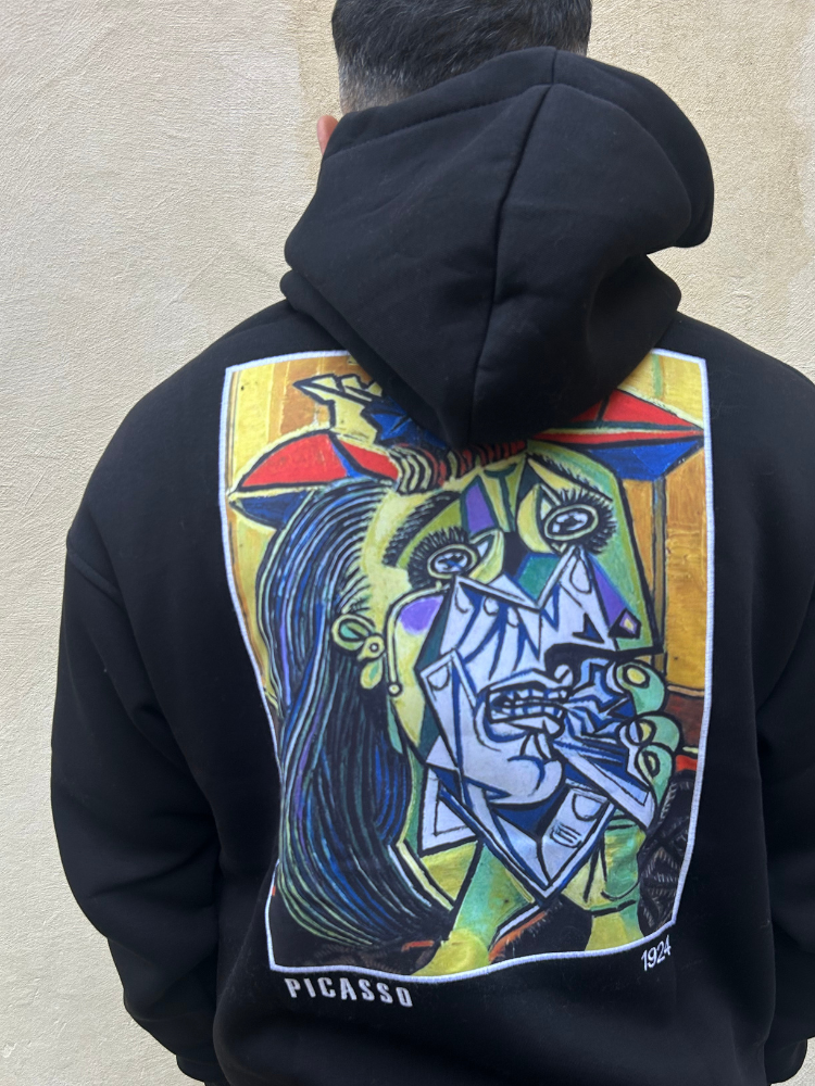 Pull noir à capuche motif Picasso